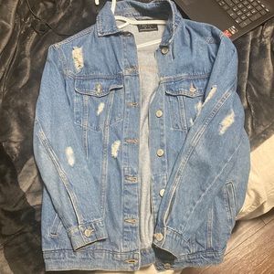 Jean jacket with rips